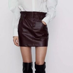 Burgundy faux leather skirt from Zara